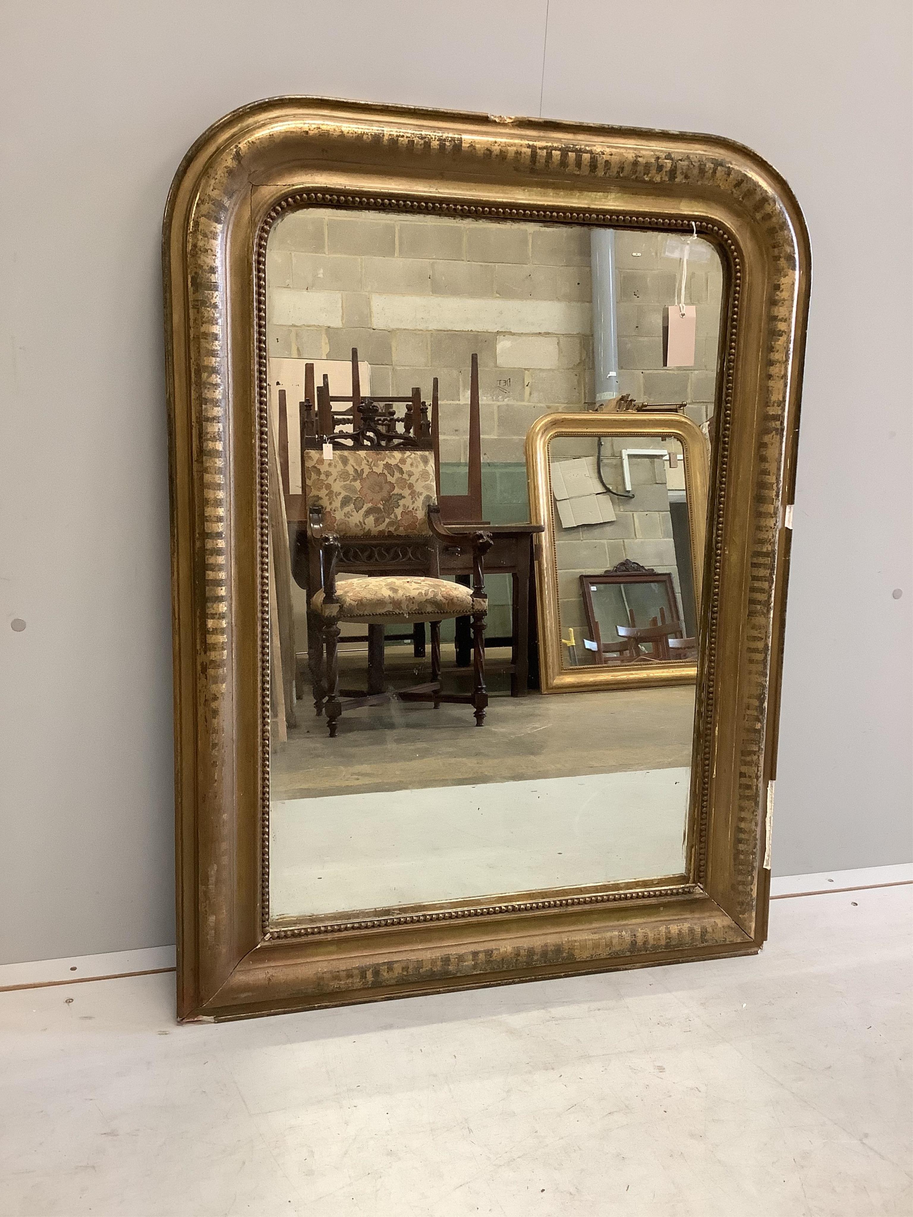 A 19th century French giltwood and composition overmantel mirror, width 76cm, height 105cm. Condition - fair